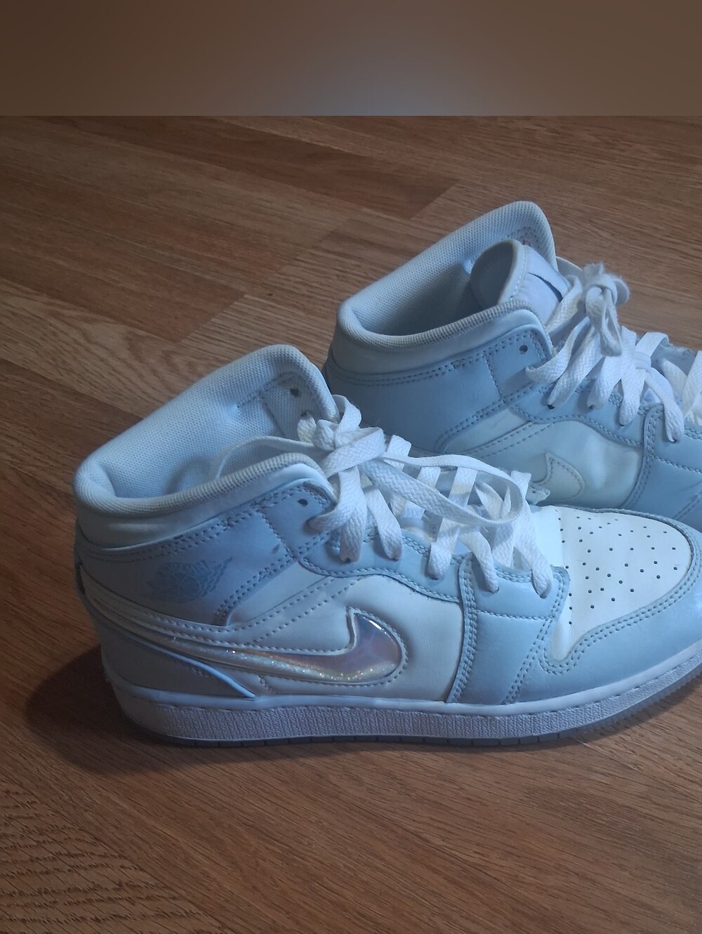 Nike White Mid-Top Sneakers with Iridescent Swoosh